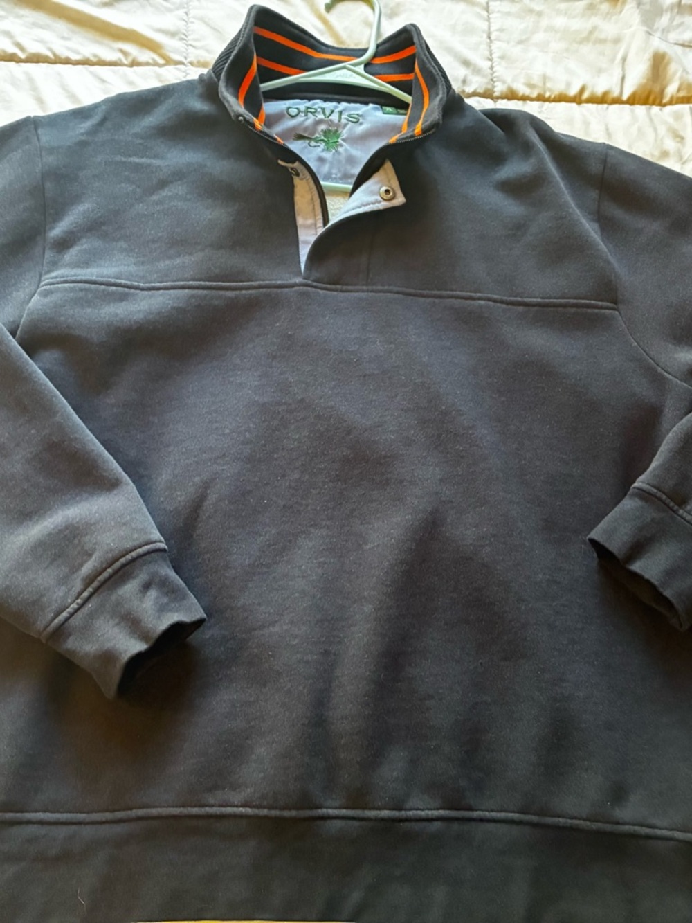 Orvis Black Pullover with Orange-Trim Collar and Green Embroidered Logo